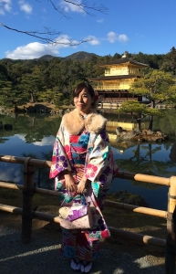Young Japanese girl at Kinkaku-ji (Golden) Temple